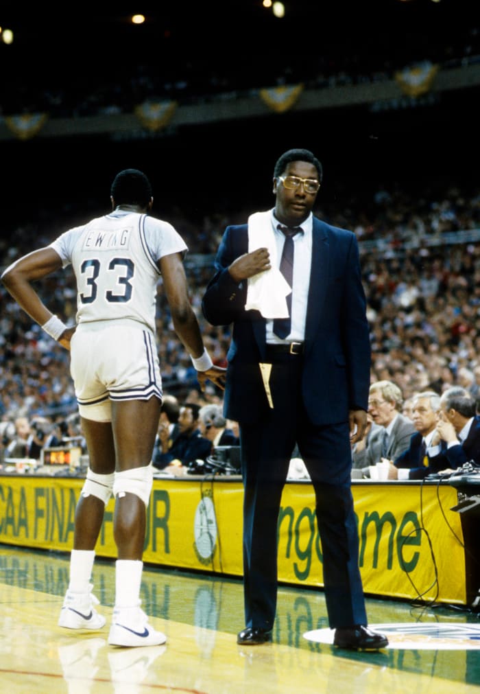 Georgetown head coach John Thompson and center Patrick Ewing during a timeout.
